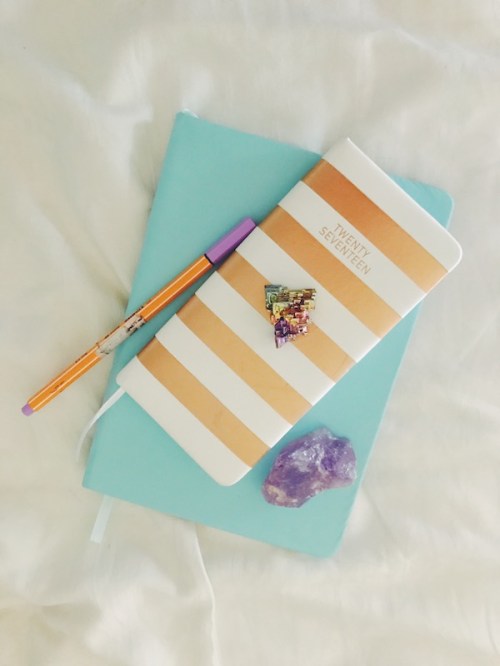 purple and rainbow crystal and diary planner